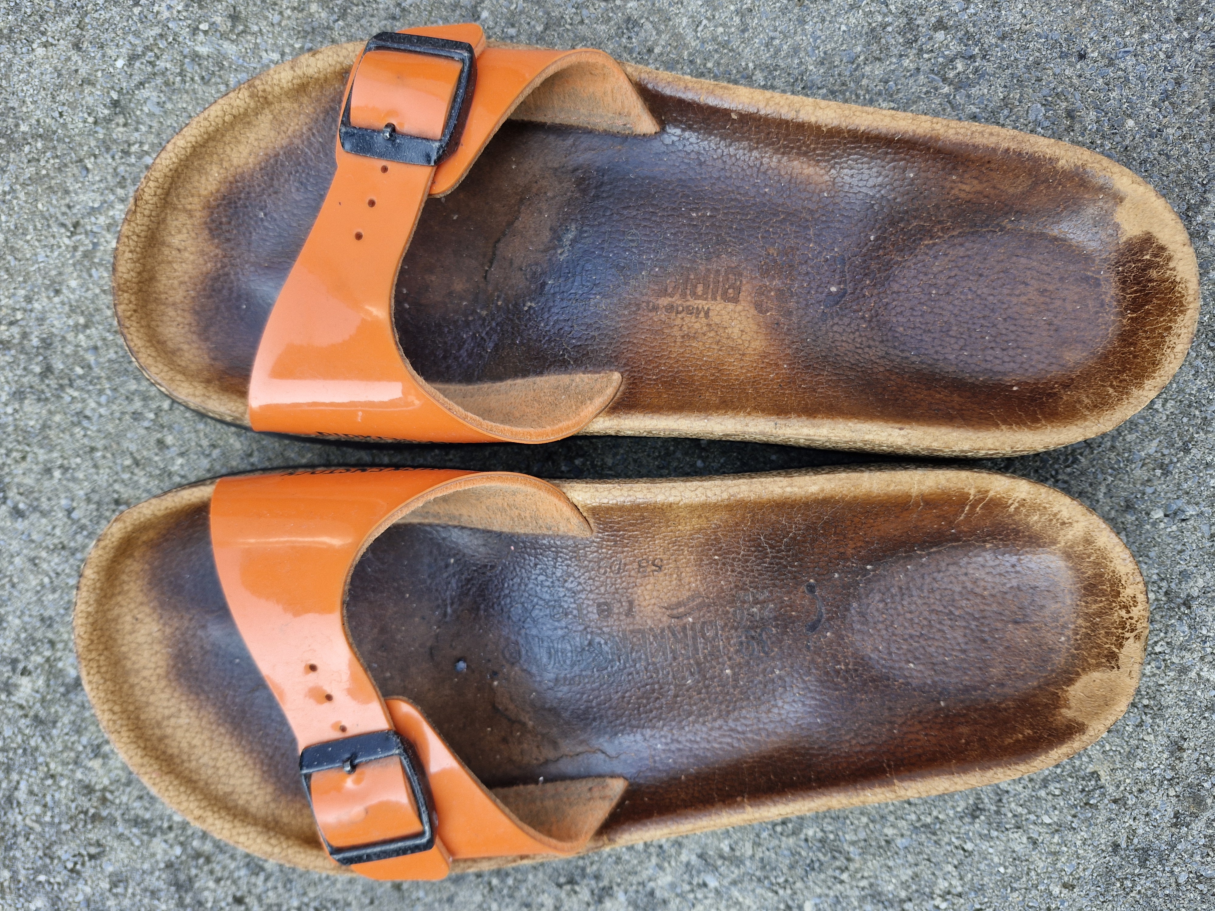 Orange Birkenstocks  by Birkenstock