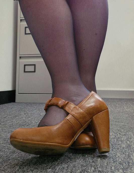 Brown, leather well-worn Nary Jane style heels