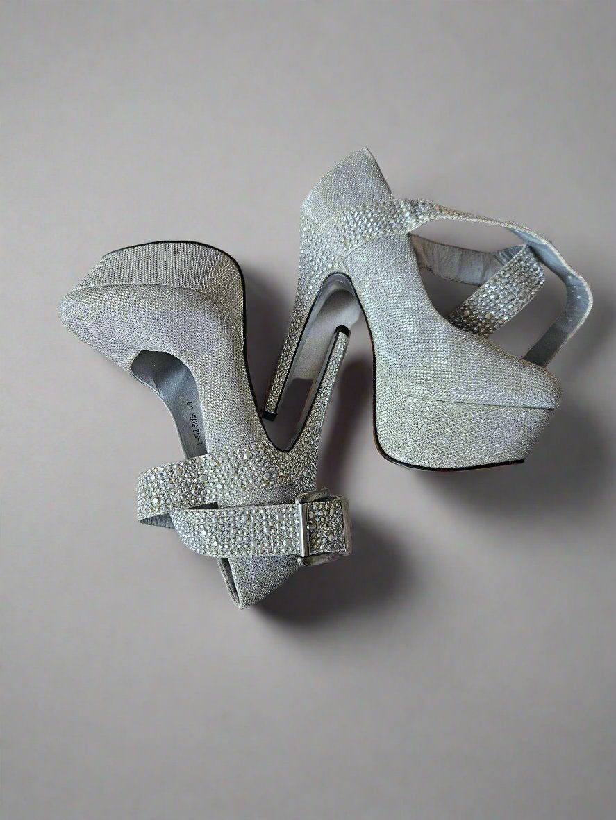 stripper heels, well worn, heavily worn