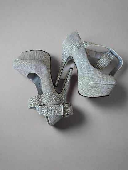 stripper heels, well worn, heavily worn